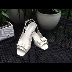 Franco Sarto leather open toe slingback pumps.